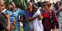 Michele Samba Malata (C), widow of Cherubin Okende, a former Minister of Transport turned opposition MP, reacts during his funeral service in Kinshasa, Democratic Republic of Congo, 20 March 2024. Okende was found dead in his car with gunshot wounds in Kinshasa in July 2023. A government spokesman at the time tweeted of 'assassination' but in February 2024, the Court of Cassation of Kinshasa concluded that Okende had committed suicide after a seven-month investigation.  EPA-EFE/CHRIS MILOSI