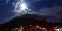 Moonset over Lions Head with a dash of Red Splendido. Winter Soulstice in all its splendor the full moon peaked out to say "Hi" just before she sank behind the Lion and into the silver waves below. Image: George Sax Entertainment <br>www.georgesaxentertainment.co.za