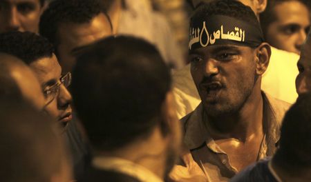 Mursi decree stirs debate on Brotherhood role