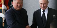 Kim Jong-un, North Korea's leader, left, shakes hands with Vladimir Putin, Russia's president, ahead of the summit on Russky Island near Vladivostok, Russia, on 25 April 2019. (Photo: Andrey Rudakov / Bloomberg via Getty Images)