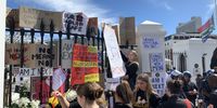 Message fence. Protestors place their posters and flowers on parliament's fence at the end of the protest march against femicide and Gender Based Violence on 5 September 2019 outside Parliament in Cape Town. Photo: Anso Thom
