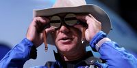 VAN HORN, TEXAS - JULY 20: Jeff Bezos holds the aviation glasses that belonged to Amelia Earhart as he speaks during a press conference about his flight on Blue Origin’s New Shepard into space on July 20, 2021 in Van Horn, Texas. Mr. Bezos said he brought the glasses with him on the flight. Mr. Bezos and the crew that flew with him were the first human spaceflight for the company. (Photo by Joe Raedle/Getty Images)