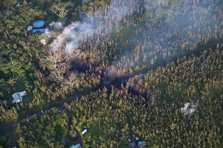 Hawaii volcano eruption spews lava into residential areas