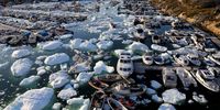 ILULISSAT, GREENLAND - SEPTEMBER 02: Ice floats around boats in the port on September 02, 2021 in Ilulissat, Greenland. Greenland in 2021 is experiencing one of its biggest ice-melt years in recorded history. Scientists studying the Greenland Ice Sheet observed rainfall on the highest point in Greenland for the first time ever this August. Researchers from Denmark estimated that in July of this year enough ice melted on the Greenland Ice Sheet to cover the entire state of Florida with two inches of water. The observations come on the heels of the recent United Nations report on global warming which stated that accelerating climate change is driving an increase in extreme weather events. (Photo by Mario Tama/Getty Images)