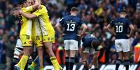 La Rochelle's players celebrate at the end of the European Champions Cup final rugby union match between Leinster and La Rochelle at the Aviva Stadium in Dublin on May 20, 2023. La Rochelle beat Leinster 27-26 to retain Champions Cup. (Photo by Anne-Christine POUJOULAT / AFP)