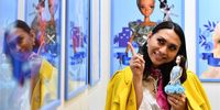 Joana Almagro, owner of the 'Ella Superstarr' company poses with one of her dolls during the 2023 International Toy Fair Press Preview in Nuremberg, Germany, 31 January 2023. The largest international toy fair opens its gates from 01 to 05 February 2023.  EPA-EFE/ANNA SZILAGYI