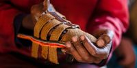 Mpho Chautsane (44) works fulltime making a repairing shoes at the closed Mabewana Primary School – one of the oldest schools in Mapetla, Soweto. (Photo: Gopolang Ledwaba)