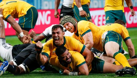 Australia weather Fijian storm to win Rugby World Cup opener