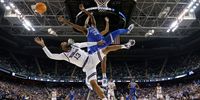 Desi Sills #13 of the Kansas State Wildcats and Cason Wallace #22 of the Kentucky Wildcats go to the floor during the first half in the second round of the NCAA Men's Basketball Tournament at The Fieldhouse at Greensboro Coliseum on March 19, 2023 in Greensboro, North Carolina. (Photo by Jared C. Tilton/Getty Images)