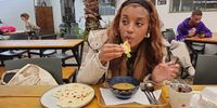 Naomi Campbell eating dahl and roti from Mother India's vendor shop. (Photo: Naomi Campbell)<br>