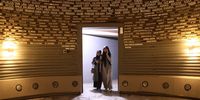epaselect epa10374466 Visitors look at a wall with the names of tsunami victims at the Tsunami Museum in Banda Aceh, Indonesia, 20 December 2022. The museum was built as a symbolic reminder of the 26 December 2004 Indian Ocean earthquake and tsunami. It is meant as an earthquake and tsunami disaster educational center as well as an emergency shelter if another tsunami should occur. On 26 December 2022 Indonesia will mark the 18th anniversary of the 2004 tsunami which was triggered by a 9.2 earthquake in the Indian Ocean off the west coast of northern Sumatra, that killed an estimated 230,000 people in 14 countries.  EPA-EFE/HOTLI SIMANJUNTAK