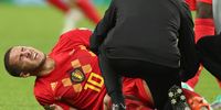Eden Hazard of Belgium receives medical attention during the FIFA World Cup 2018 semi final soccer match between France and Belgium in St.Petersburg, Russia, 10 July 2018. EPA-EFE/TOLGA BOZOGLU  