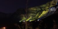 The iconic Table Mountain lit up for the fighters and survivors and those who have passed away from childhood cancer in Cape Town Tuesday, October, 6, 2020. The international awareness symbol for Childhood Cancer is a gold ribbon. This ribbon symbolises all forms of cancer affecting children and adolescents, unlike other ribbons, which focus on one particular cancer. Photo: Nardus Engelbrecht