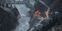 epa09618964 A general view of the damaged Dhauliganga hydro power project in Chamoli district, Uttarakhand, India, 09 February 2021. At least 72 people died after part of the Nanda Devi glacier fell into the river, triggering a flood that burst open a dam in the Tapovan area of Uttarakhand's Chamoli district on 07 February 2021.  EPA-EFE/RAJAT GUPTA