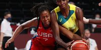 SAITAMA, JAPAN - AUGUST 04: Ariel Atkins #7 of Team United States and Ezi Magbegor #13 of Team Australia fight for possession during the second half of a Women's Basketball Quarterfinals game on day twelve of the Tokyo 2020 Olympic Games at Saitama Super Arena on August 04, 2021 in Saitama, Japan. (Photo by Kevin C. Cox/Getty Images)