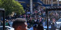 Sprinkbok supporters waiting for the Bokke's to arrive in Braamfontein on the first day of their victory tour, 2 November 2023. (Photo: Julia Evans)