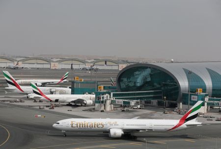 Airlines weigh Middle East cancellations after US strikes in Iran strand thousands