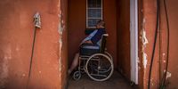 Wheelchair bound Gert (last name unknown) sits on the stoep of his home in Kgetlengrivier Local Municipality (Koster), North West Province. He said he is not interested in politics because there is not much that will change.<br>Photo: Shiraaz Mohamed.