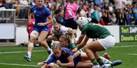 Emilie Boulard of France scores her team’s first try. (Photo: Matthew Lewis / Getty Images)