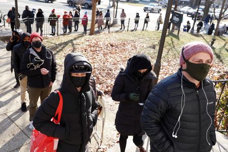 US regulators clear Merck Covid-19 pill; South Africa registers 21,156 new cases