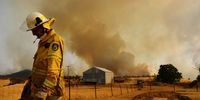 TUMURUMBA, AUSTRALIA - JANUARY 11: A Rural Fire Service firefighter Trevor Stewart views a flank of a fire on January 11, 2020 in Tumburumba, Australia. Cooler temperatures forecast for the next seven days will bring some reprieve to firefighters in NSW following weeks of emergency level bushfires across the state, with crews to use the more favourable conditions to contain fires currently burning. 20 people have died in the bushfires across Australia in recent weeks, including three volunteer firefighters. About 2079 homes have been destroyed this bushfire season in NSW, more than half of them since January 1, and 830 homes have been damaged. (Photo by Sam Mooy/Getty Images)
