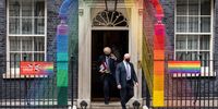 LONDON, ENGLAND - JUNE 30: Britain's Prime Minister Boris Johnson (C) walks beneath the Pride Month installation outside number 10, as he heads to the weekly PMQ session in the House of Commons, at Downing Street on June 30, 2021 in London, England. (Photo by Leon Neal/Getty Images)