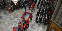 he coffin of Queen Elizabeth II with the Imperial State Crown resting on top is carried by the Bearer Party into Westminster Abbey during the State Funeral of Queen Elizabeth II on September 19, 2022 in London, England. Elizabeth Alexandra Mary Windsor was born in Bruton Street, Mayfair, London on 21 April 1926. She married Prince Philip in 1947 and ascended the throne of the United Kingdom and Commonwealth on 6 February 1952 after the death of her Father, King George VI. Queen Elizabeth II died at Balmoral Castle in Scotland on September 8, 2022, and is succeeded by her eldest son, King Charles III.  (Photo: Gareth Cattermole / Getty Images)