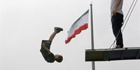 A boy jumps off a platform during a free jumping-diving competition at the Adrenaline Park, in Tehran, Iran, 31 May 2023. Some thirty youth Iranian participate in the competition as the rest of the match postponed for another day due to bad weather.  EPA-EFE/ABEDIN TAHERKENAREH