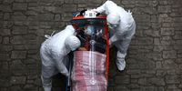 SEOUL, SOUTH KOREA - MARCH 09: Medical staff, wearing protective gear, move a patient infected with the coronavirus (COVID-19) from an ambulance to a hospital on March 09, 2020 in Seoul, South Korea. The South Korean government has raised the coronavirus alert to the "highest level" as confirmed case numbers continue to rise across the country. According to the Korea Centers for Disease Control and Prevention, 69 new cases were reported on Monday, with the death toll rising to 53. The total number of infections in the nation tallies at 7,382, the highest outside of China. (Photo by Chung Sung-Jun/Getty Images)