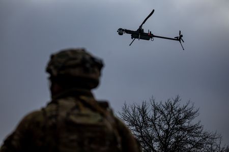 Rescuers dig for missing US soldiers' vehicle in Lithuania