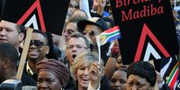 Ministers Nkosazana Dlamini Zuma and Angie Motshekga joined a crowd at Nelson Mandela Square to sing 'Happy Birthday' to former president Nelson Mandela on 29 May, 2012 in Johannesburg South Africa. (Photo: Gallo Images / Daily Sun / Sipho Maluka)
