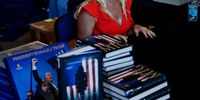Republican US Representative from Georgia Marjorie Taylor Greene reacts while signing books for supporters before former US president and Republican presidential nominee Donald Trump speaks at the Turning Point PAC campaign rally at the Gas South Arena, in Duluth, Georgia, USA, 23 October 2024. Trump is running against Democratic US Vice President Kamala Harris.  EPA-EFE/ERIK S. LESSER