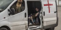 Locals, about to be evacuated, sit in a vehicle in Lysychansk, Luhansk area, Ukraine, 18 June 2022, five kilometers north-east of Severodonetsk. The city and its surroundings have turned into a battlefield in the past weeks. EPA-EFE/OLEKSANDR RATUSHNIAK