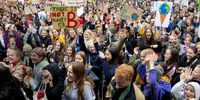 epa07856016 People hold placards during the Global Climate Strike at Raadhuspladsen in Copenhagen, Denmark, 20 September 2019. People around the world are taking part in protests demanding action on climate issues.  EPA-EFE/NILS MEILVANG  DENMARK OUT