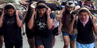 Nepalese youths carry 35kg baskets of sand during training in 2008 to join the British army or Singapore Police (Photo: EPA / Narendra Shrestha)