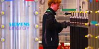 Employees work at an assembly line during the opening of Siemens Energy's new Gigafactory for the production of electrolysers, in Berlin, Germany, 08 November 2023. According to Siemens Energy, it intends to manufacture modules for hydrogen electrolysers on a gigawatt scale at its site in Berlin and move on to industrial series production. Electrolysers are devices that break down water into the basic components hydrogen and oxygen in an industrial process. If the electricity used for this comes from climate-friendly or low-CO2 emission sources such as wind and solar energy or hydropower, it is called green hydrogen.  EPA-EFE/HANNIBAL HANSCHKE