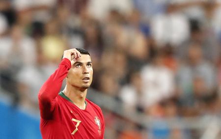 Portugal concede late penalty as Uruguay await in last 16