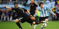 Lionel Messi of Argentina evades the tackle by Bastian Schweinsteiger of Germany during the 2010 Fifa World Cup South Africa quarterfinal at Green Point Stadium in Cape Town on 3 July 2010. (Photo: Clive Mason / Getty Images)