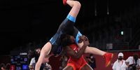 CHIBA, JAPAN - AUGUST 02: Tamyra Marianna Stock Mensah of Team United States competes against Feng Zhou of Team China during the Women's Freestyle 68kg 1/4 Final on day ten of the Tokyo 2020 Olympic Games at Makuhari Messe Hall on August 02, 2021 in Chiba, Japan. (Photo by Tom Pennington/Getty Images)