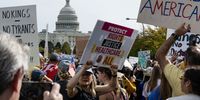 'No Kings' protesters in Pennsylvania Avenue, Washington, DC with the US Capitol in the background.(Photo: Luke Johnson / EPA)