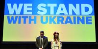 ABERDEEN, SCOTLAND - MARCH 18: Scottish Conservative Party leader Douglas Ross and Ukrainian aid worker Zhenya Dove stand together during the Scottish Conservative Party conference on March 18, 2022 in Aberdeen, Scotland. Scottish Conservative Party Leader, Douglas Ross, recently called for the Prime Minister's resignation over "Partygate" but he has offered Boris Johnson the full support of the Scottish party since the Russian invasion of Ukraine. (Photo by Michal Wachucik/Getty Images)