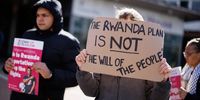 Campaigners protest against the British government's Rwanda deportation scheme outside a Home Office immigration reporting center in Croydon, south London, Britain, 29 April 2024. The UK Home Office is reported to be starting to detain asylum seekers across the UK in preparation for their deportation to Rwanda in the following weeks.  EPA-EFE/TOLGA AKMEN