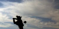  A silhouette of Nelly Korda of Team United States as she tees off on the 12th hole during a practice round ahead of the Women's Individual Stroke Play on day eleven of the Olympic Games Paris 2024 at Le Golf National on August 06, 2024 in Paris, France. (Photo by Andrew Redington/Getty Images)