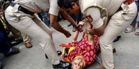 Indian police detain a woman during a protest by pro-Kannada activists against the Supreme Court's order on the Cauvery river water dispute and Tamil Nadu chief minister in Bangalore, India, 26 September 2023. Hundreds of farmers and pro-Kannada activists staged a protest calling for a 'Bangalore Bandh' and Section 144 implemented across the city, following the Indian Supreme Court's order and the Cauvery Water Management Authority (CWMA) order directed Karnataka to continue releasing 5,000 cusecs of water to Tamil Nadu for another 15 days.  EPA-EFE/JAGADEESH NV