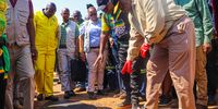 Cyril Ramaphosa inspect the one of many potholes he just fixed in Delmas Mpumalanga as part of the Letsema campaign. (Photo: Cebile Ntuli)