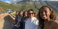 Myia Dargan, Kena Kimani, Laurenne Yomi Mvete, Dee Moskoff and Naomi Campbell enjoying the views at Table Mountain. (Photo: Naomi Campbell)