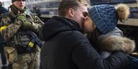 epaselect epa09817307 A young man kisses goodbye his girlfriend at Kyiv Main Railway Station as she tries to flee from Kyiv (Kiev), Ukraine, 11 March 2022. Thousands of people desperately try to leave Kyiv, the capital of Ukraine, which has been under Russian military attack. According to UNHCR figures, 2.5 million Ukrainians have fled their country since Russia began its military operation in Ukraine on 24 February.  EPA-EFE/MIKHAIL PALINCHAK