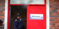 A policeman at the Youth For Christ Kids centre voting station during by-elections in Borcherds, George. (Photo: Shelley Christians)
