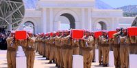 Mourners attend a reburial ceremony for the remains of 100 Barzanis, at a monument in Barzan, northern Iraq, 31 July 2022. The bodies of  100 victims of the 1983 Barzan massacre found in southern Iraqi mass graves were returned to Barzan village and reburied during a ceremony. Some 8,000 men of the Kurdish Barzani tribe were killed in July and August 1983 upon orders of then Iraqi president Saddam Hussein in what the Supreme Iraqi Criminal Tribunal in May 2011 ruled to be an act of genocide.  EPA-EFE/Gailan Haji