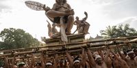 Balinese youths carry ogoh-ogoh, the giant menacing-looking dolls during Kasanga Festival on the eve of Nyepi, the Balinese Hindu Day of Silence that marks the arrival of the new Saka lunar year on March 18, 2023 in Denpasar, Bali, Indonesia. Balinese Hindus perform a series of rituals in early March to celebrate the lunar new year, which culminates in the observance of Nyepi. The Ogoh-ogoh became a staple of the parade in the early 1980s. Prior to that, the participants roamed the streets carrying bamboo torches and making loud noises with percussion instruments to scare away the demons. In present-day Bali, the majority of ogoh-ogoh are built by members of seka teruna teruni, the youth wing of banjar. Nyepi comes from the word sepi or sipeng which means lonely, quiet, silent, zero, empty, no crowd, no noise, and no activity. Since 1983, Nyepi has been a national holiday. The celebration of the Nyepi festivities for Balinese Hindus in Indonesia is an opportunity for self-reflection which is called mulat sarira. All residents and visitors are required to abide by the rules called Catur Brata Penyepian, consisting of: no open fires or flames, no pleasurable activities, no work or labor, and no journeys.(Photo by Agung Parameswara/Getty Images)